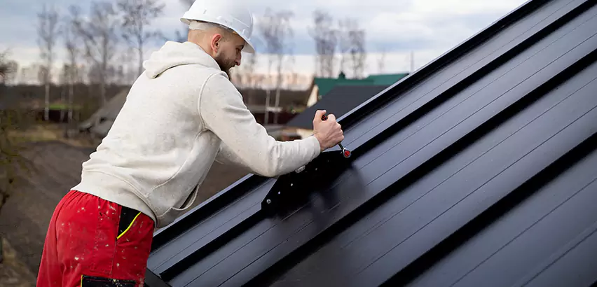 Tin Roof Ridge Cap Installation in Concho